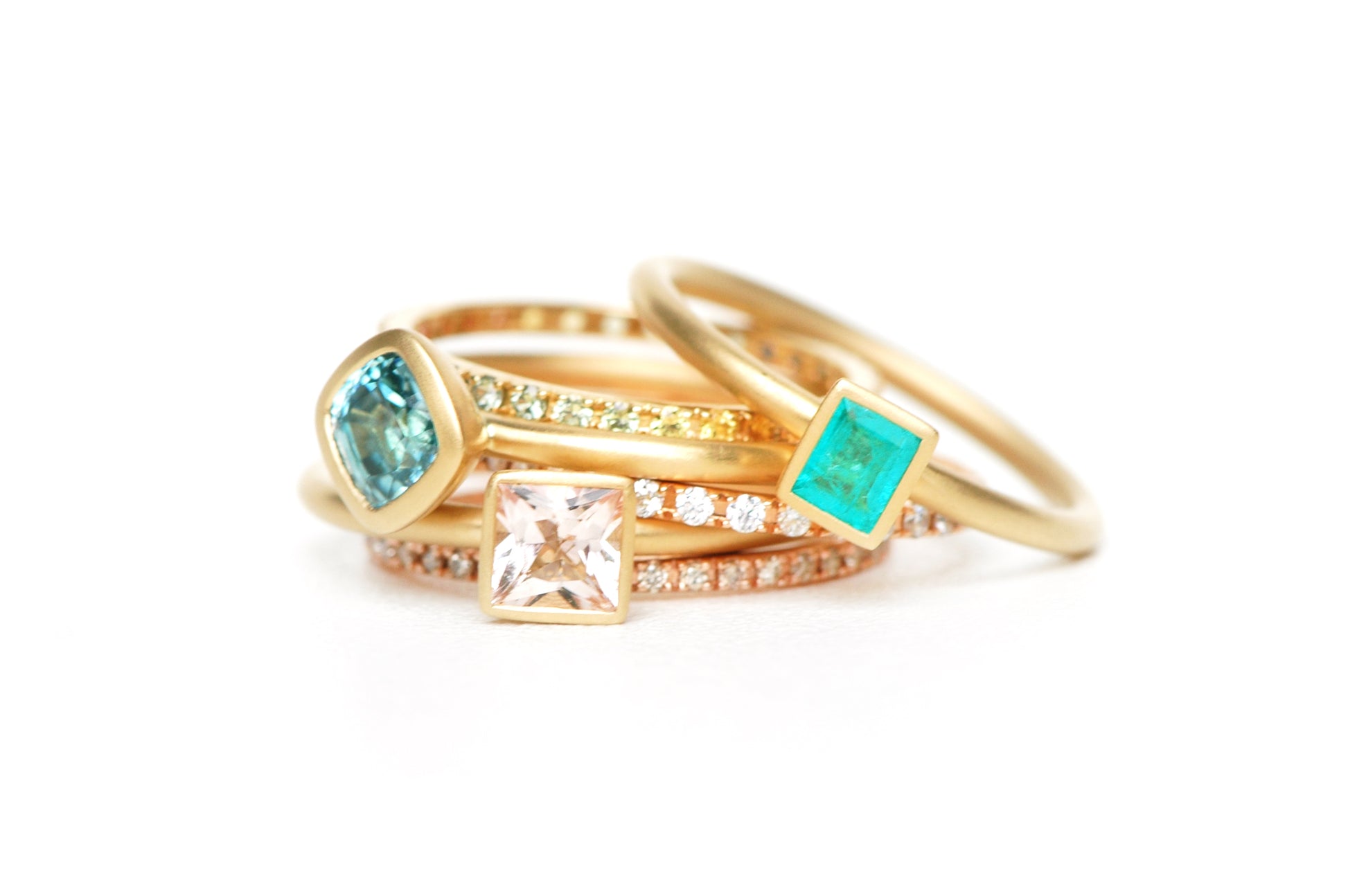 Versatile and customizable 18 karat yellow gold stackable ring, part of a collection that allows for mixing and matching different gemstones and shapes to build your ideal stack.