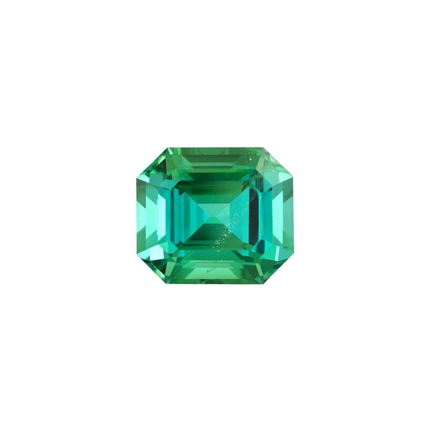 4.38 carat Afghani blue-green tourmaline, emerald cut, known for its deep and vivid coloration. Ideal for a custom-designed, luxurious cocktail ring.