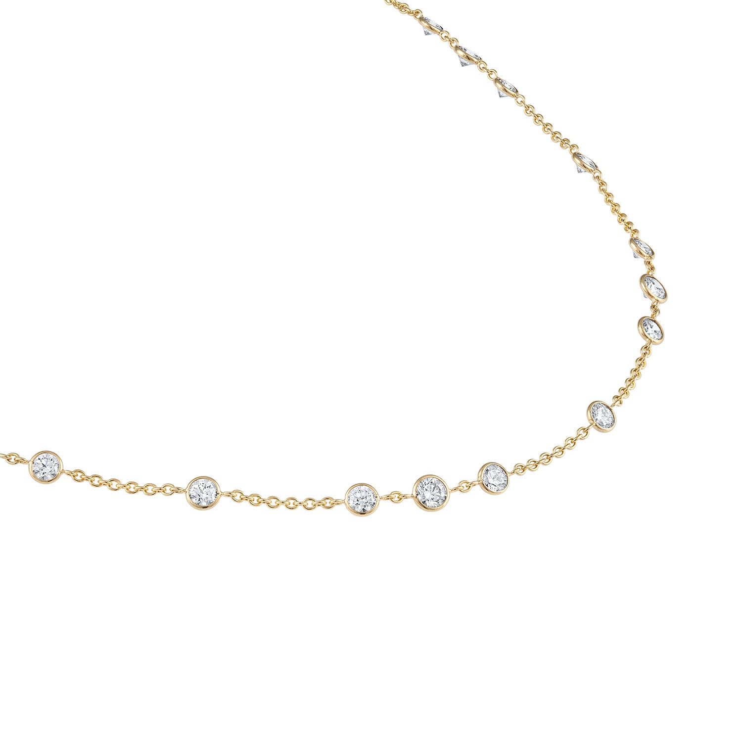 Side view of the Diamonds by the Yard necklace in gold, showcasing over five carats of top quality diamonds set in a handmade design, perfect for versatile wear.