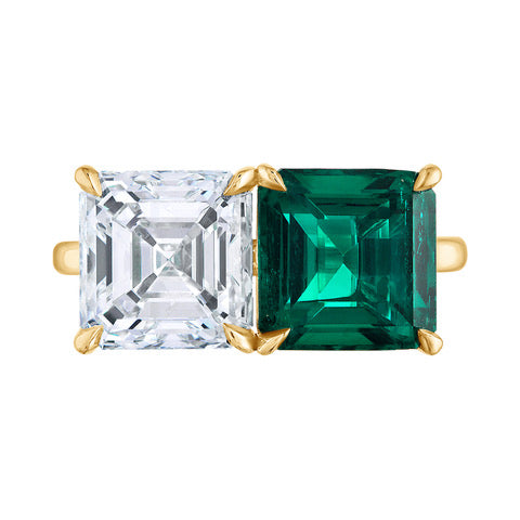 Front view of the Emerald and Diamond Toi et Moi Ring featuring a 3.5 carat Colombian emerald and a 3.5 carat D color VS1 diamond, set in handmade 18 karat yellow gold.